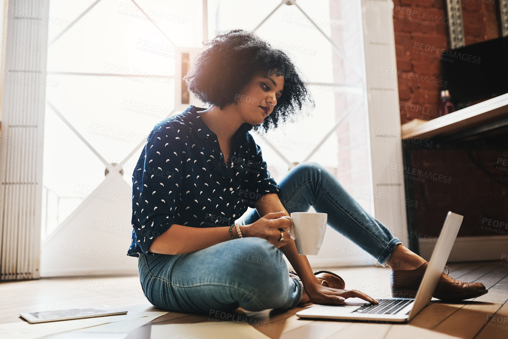 Buy stock photo Woman, coffee and laptop on floor for remote work from home office in morning, scroll and thinking for freelance job. Person, writer and happy to relax with tea cup, drink and computer in apartment