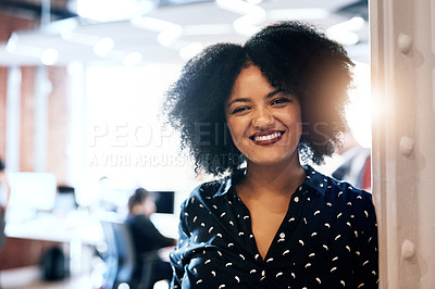 Buy stock photo Portrait of an attractive young female designer smiling and in good spirits at the office