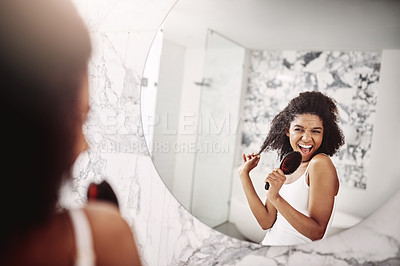 Buy stock photo Woman, beauty and singing in mirror at apartment for haircare, fun, and preparing for the day. Female glow, happy and skincare with singer in the mirror for morning routine with hair and happiness.