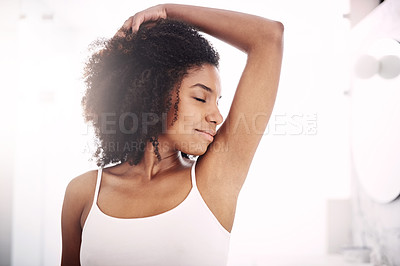 Buy stock photo Happy African woman, smelling armpit and bathroom in home with fragrance, clean and morning routine. Girl, hygiene and grooming with cleaning, fresh scent and check for self care, wellness or health
