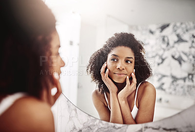 Buy stock photo Model, face and skincare with reflection and glow in the morning for facial treatment for wellness. Beauty, skin and dermatology in the bathroom with a mirror for self care at an apartment for care face