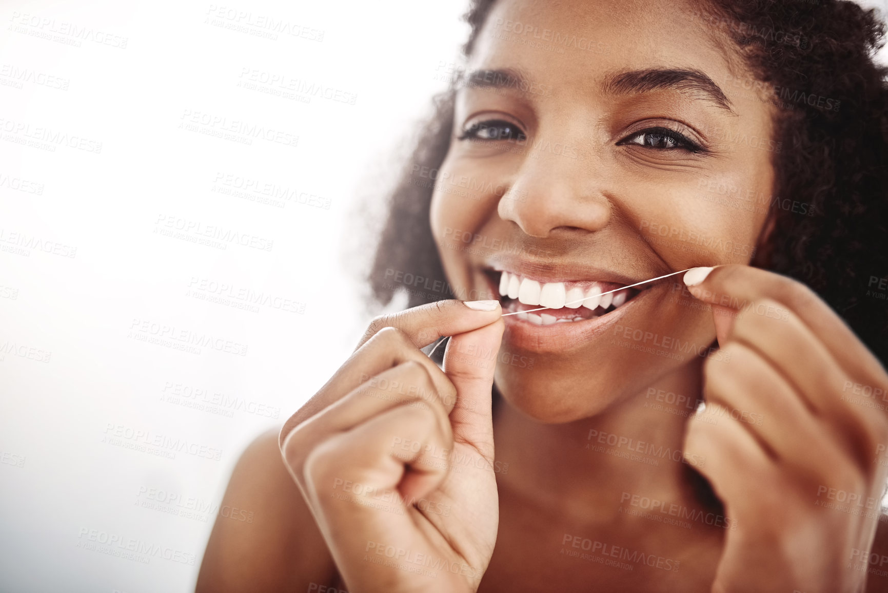 Buy stock photo African woman, portrait and floss tooth for dental care, wellness and morning routine in bathroom. Face, happy person and cleaning teeth with string for oral health and hygiene on background in home