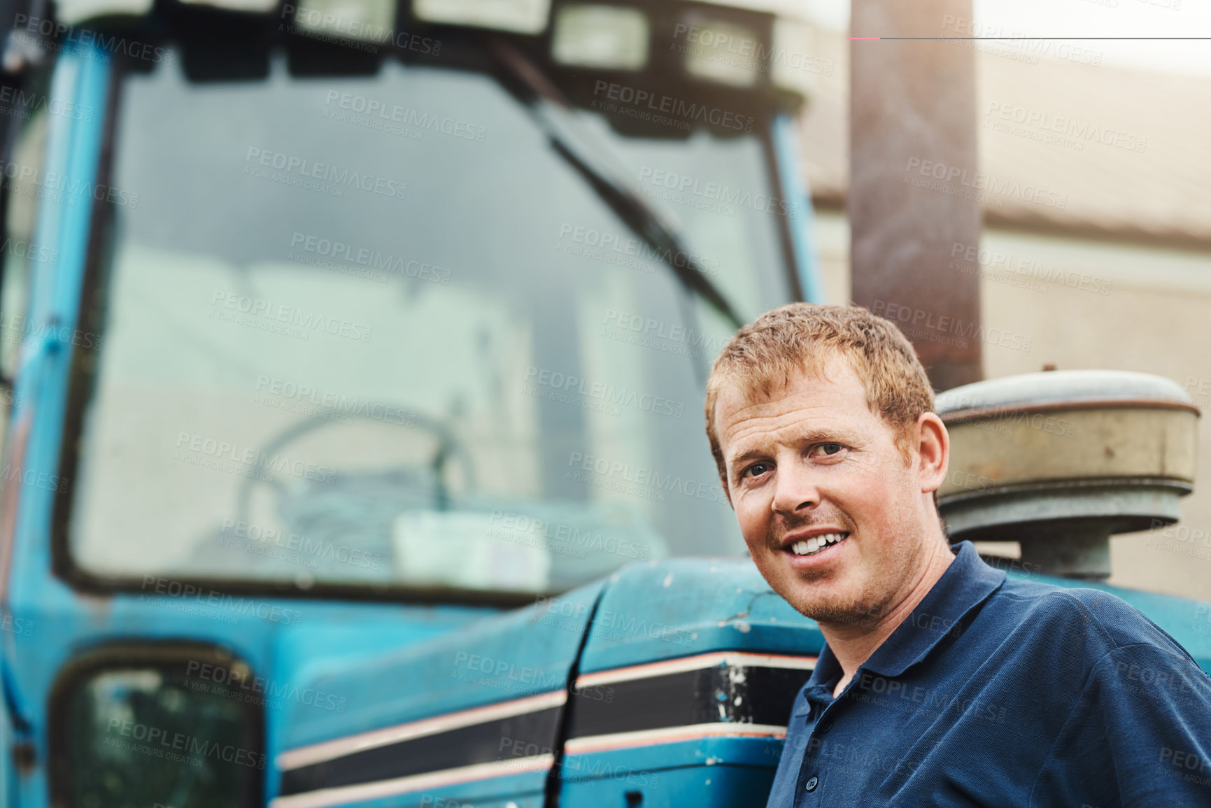 Buy stock photo Man, portrait and farmer by tractor outdoor in nature for transportation, maintenance and mowing or planting. Male person, agricultural equipment and machine for Irrigation, cultivation and plowing.