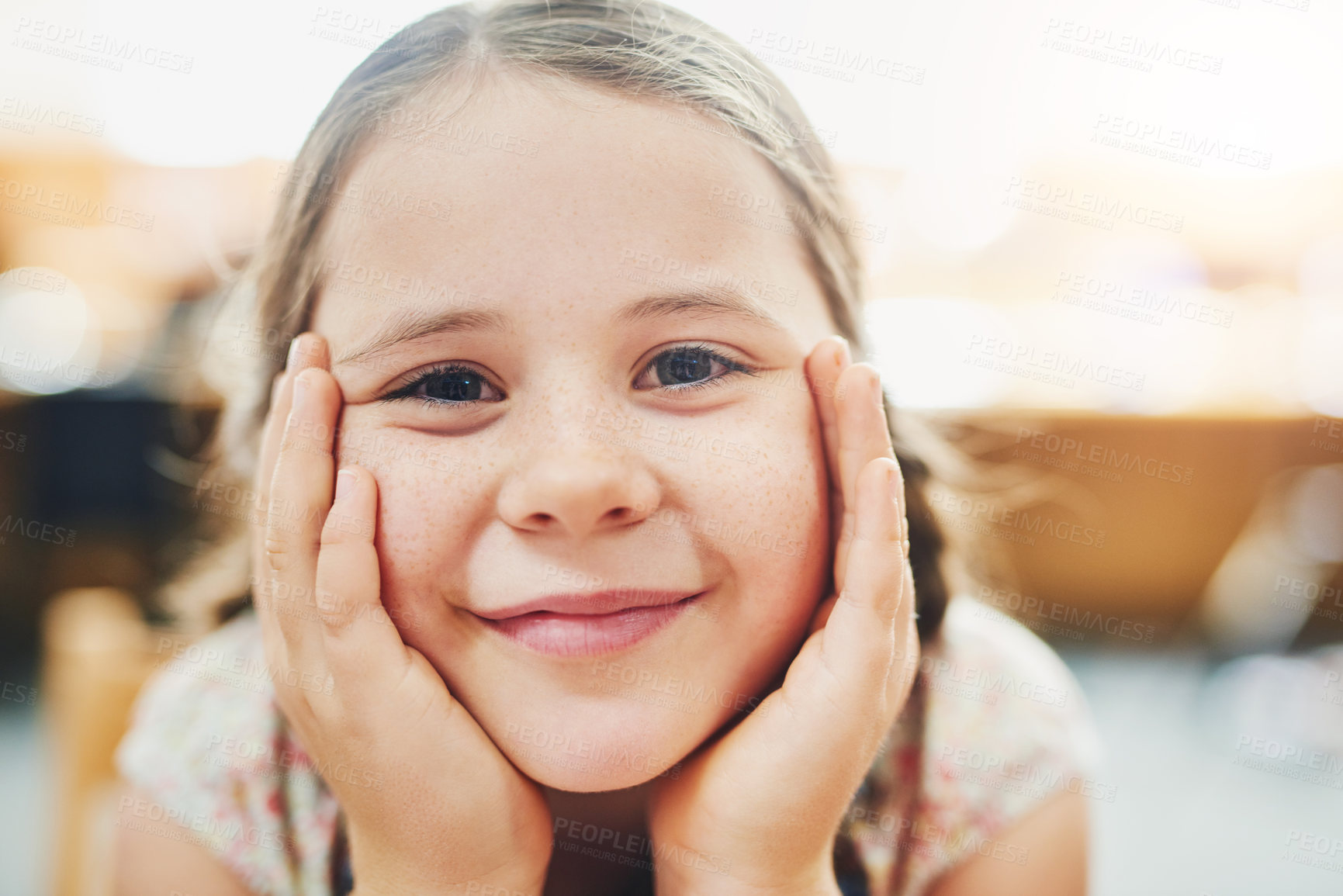 Buy stock photo Education, classroom and portrait of child with smile for academic lesson, learning and break at school. Girl, student and face with hands at montessori for knowledge, development or growth in future