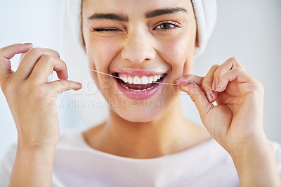 Buy stock photo Portrait, smile and woman with floss, dental and hygiene with wellness, happiness and fresh breath. Face, female person and girl with oral health, bathroom and cleaning with self care and cosmetics