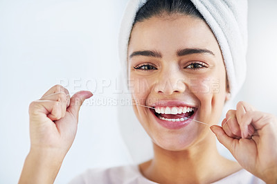 Buy stock photo Portrait, happy and woman with floss, dental and oral health with happiness, cosmetics and fresh breath. Face, female person or girl in a bathroom, cleaning or self care with morning routine or teeth