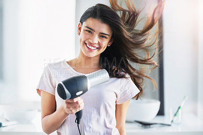 Buy stock photo Woman, portrait and dryer wind in home, grooming and equipment for volume in bathroom. Female person, cosmetics tool and appliance for hairstyle, Indonesia and heat treatment for healthy texture