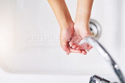 Buy stock photo Closeup shot of an unrecognizable woman washing her hands