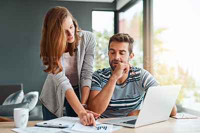 Buy stock photo Couple, home and living room laptop or paperwork for email, online and website for loan application. People, relationship and explain for budget or saving plan for house finance, mortgage and bills