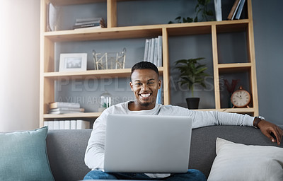 Buy stock photo Man, portrait and laptop in home on sofa, networking and social media for online streaming in living room. Happy, research and technology on website, remote work and internet blog in apartment