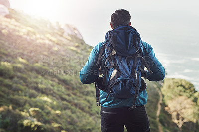 Buy stock photo Backpack, hiking and mountain with man, travel and sunshine with environment, journey and training. Rear view, hiker and person with vacation, healthy and wellness with adventure, nature and holiday