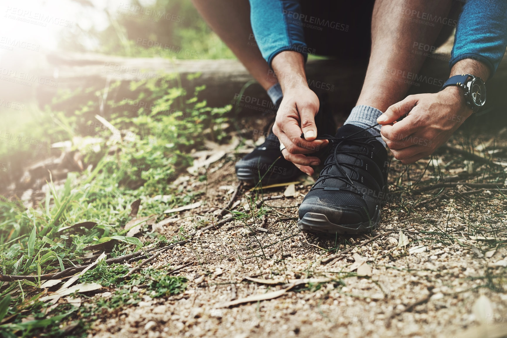 Buy stock photo Tying laces, fitness and hands in nature to start walking, adventure or trekking for exercise. Shoes, sports and feet of a man getting ready for cardio, training or a walk for a workout in a park