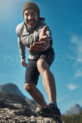 Buy stock photo Hiking, hand support and happy man in the mountains with eco travel and climbing with smile. Vacation, below and summit for exercise, fitness and training outdoor on Peru holiday in nature on rock