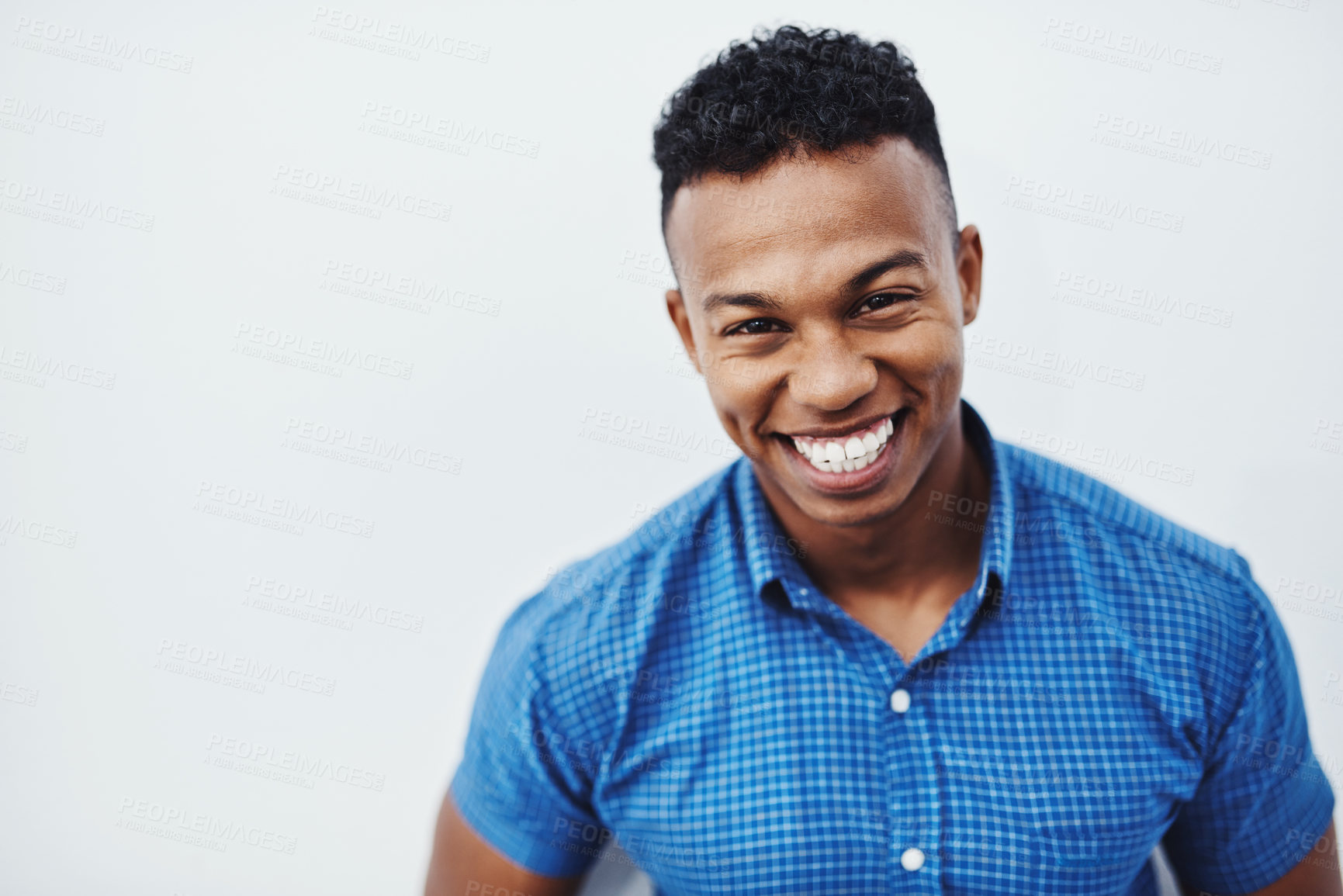 Buy stock photo Happy, portrait and funny man laughing in studio with mockup, positive attitude and feel good mood or confidence on white background. Comic, face and African model smile for goofy joke or comedy