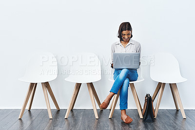 Buy stock photo Laptop, internet and woman in interview waiting room and she search a website, connection or web sitting on chairs. Internship, work and young female person email online ready for a new job