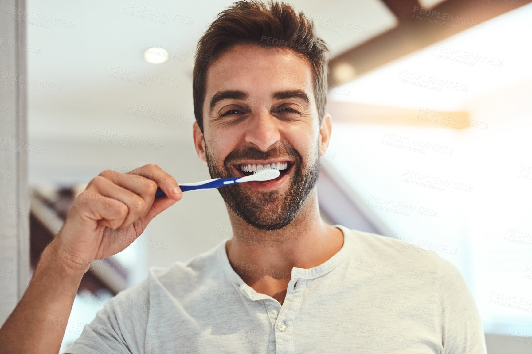 Buy stock photo Dental, portrait and brushing teeth with man in bathroom for cleaning, morning routine and oral hygiene. Smile, cosmetics and health with person and toothbrush at home for self care, breath and mouth