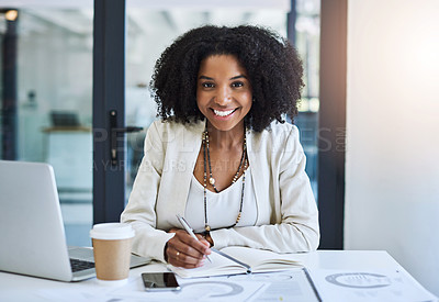 Buy stock photo Portrait of a young businesswoman smiling and in good spirits at her office desk