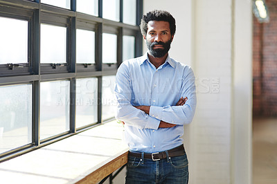 Buy stock photo Portrait, window and a business man arms crossed in the office with a mindset of focus on future success. Serious, vision and corporate with a male employee standing in the workplace during his break