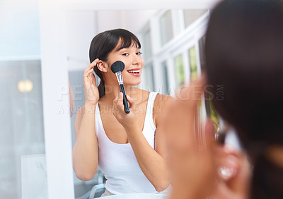 Buy stock photo Woman, brush and apply powder in mirror for beauty, makeup and foundation for cosmetics in bathroom. Female person, tool and blush or highlighter for dermatology, reflection and happy for change