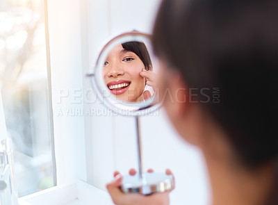 Buy stock photo Woman, beauty and skincare routine in mirror for wellness, healthy skin and face products. Female person, smile and cosmetics for clear, pure and hydrated in home for dermatology, clean and moisture