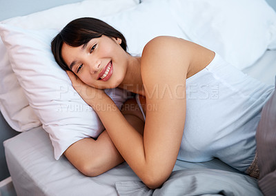 Buy stock photo Portrait, woman and happy on bed with pillow, dreaming and healthy body for sleeping. Smiling, blanket and face of female person in bedroom for peaceful rest with lazy weekend, comfortable and duvet