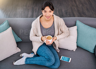 Buy stock photo Portrait, coffee and woman on couch with phone for social media on weekend with high angle in home. Smile, relax and happy girl on sofa with smartphone for break, network and technology in apartment