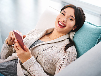 Buy stock photo Asian, gen z and comedy with smartphone on sofa for streaming, social media and communication. Networking, funny and technology in apartment for connection, happiness and mobile app in house.