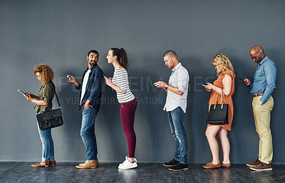 Buy stock photo Businesspeople, waiting and queue with technology for hiring, job recruitment or onboarding. Men, women and corporate diversity in line with cellphone for staff interview, human resources or meeting