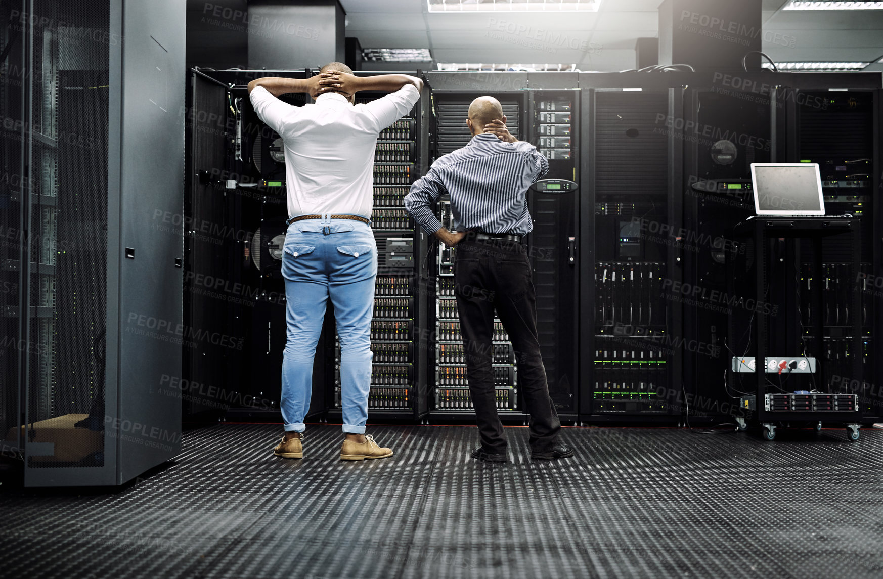 Buy stock photo Server room, it support or electrician fixing a problem for hardware maintenance or stressful glitch crisis. Confused or back of worried technicians or electrical engineers in information technology