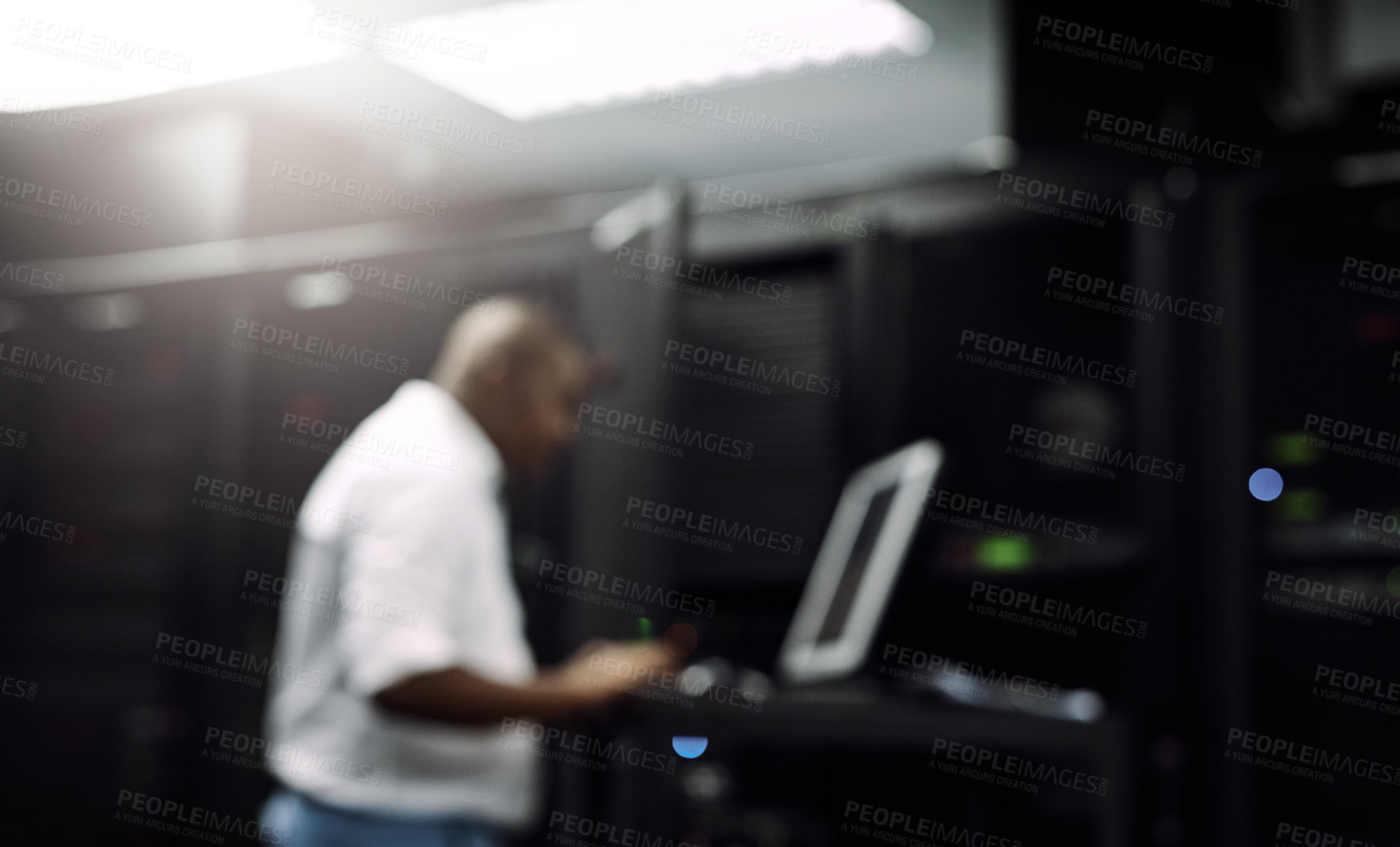 Buy stock photo Code, black man or coding on computer in server room for big data, tech glitch or digital website. IT support, blurry or technician typing on laptop testing UX, programming or software development