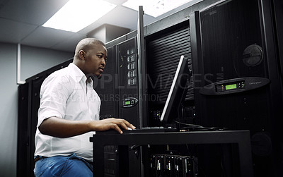 Buy stock photo Engineer, black man or coding on laptop in server room for big data, network glitch or digital website. Code, IT support or technician typing on computer testing, programming or software development