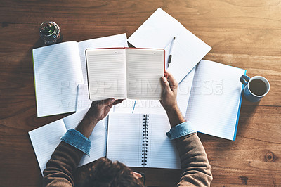 Buy stock photo Law student reading books, studying paperwork or preparing to pass the bar test while learning late at night from above. Lawyer, paralegal or attorney working on education degree or homework deadline