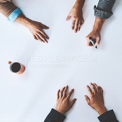 Buy stock photo Whiteboard, writing, and closeup of hands isolated at desk or office. Meeting, teamwork and planning session at table  together inside. Collaboration, ideas and innovation copyspace from angle above.