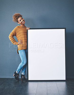 Buy stock photo Sign, board and copyspace being held by a beautiful young woman for an advert. Attractive, smiling and happy female standing with a blank announcement to voice opinion. Lady with an empty poster.