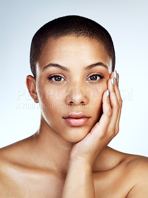 Buy stock photo Beauty, portrait and skin of natural black woman in studio on blue background for aesthetic wellness. Cosmetics, face and skincare with confident model for dermatology, foundation or vitamin c