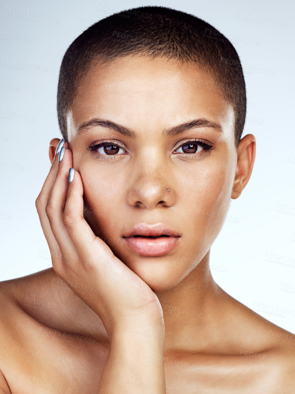 Buy stock photo Beauty, portrait and glow with natural black woman in studio on blue background for wellness. Aesthetic, cosmetics and skincare with face of confident model for dermatology or vitamin c treatment