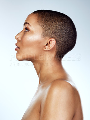 Buy stock photo African woman, profile and blue background for natural beauty or skincare with confidence, cosmetics for wellness. Female person, studio and makeup for facial, powder or foundation for transformation