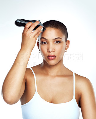 Buy stock photo Studio shot of a beautiful young woman posing against a coloured background 