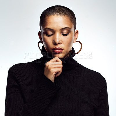 Buy stock photo Studio shot of an attractive young woman posing with her eyes closed against a grey background