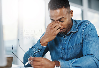 Buy stock photo Business, headache and black man in office for stress, marketing error or mistake on project. Anxiety, lens flare and graphic designer at desk for migraine, work crisis or burnout in workplace