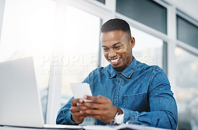 Buy stock photo Smile, cellphone and black man by computer in office, workspace and desk happy in creative career. Communication, internship and journalist with tech for contact, research and internet for working