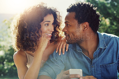 Buy stock photo Couple, phone and happy to relax in garden with thinking, ideas and memory with conversation in sunshine. Man, woman and smartphone with smile, vacation and excited for notification on mobile app