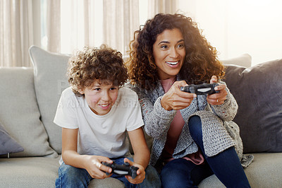 Buy stock photo Mother, son and controller with happiness for gaming on sofa with competition, contest or playing together in house. Mom, boy and online games on living room couch with excited face in family home