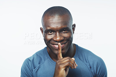 Buy stock photo Happy, portrait and black man with secret in fitness for workout or routine on a white studio background. Face of African male person with silence or whisper for training or exercise on mockup
