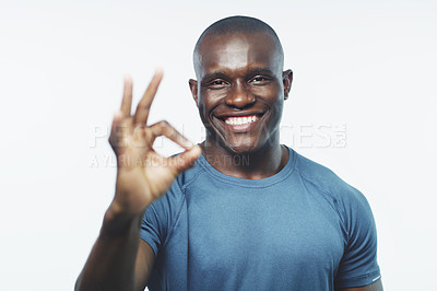 Buy stock photo Okay sign, exercise and portrait of black man on a white background for training, workout and fitness. Sports, emoji and happy male athlete for gym promotion, like and yes to wellness in studio