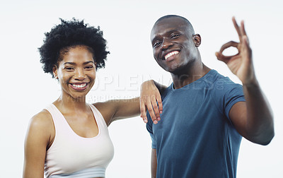 Buy stock photo Black couple, portrait and fitness with ok sign for workout, training or exercise on a white studio background. Happy African man or woman with smile, like emoji or okay for health or body perfection