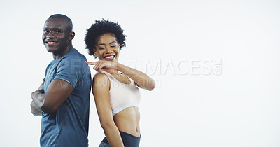 Buy stock photo Studio shot of two young athletes posing against a grey background