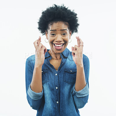 Buy stock photo Wish, black woman and portrait with fingers crossed with hope, faith and hands. White background, studio and African female person with hand sign hoping for good luck, achievement and success
