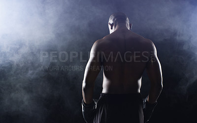 Buy stock photo Man, boxer and back of fighter athlete on black background in studio with smoke mist, competition or muscle. Male person, gloves and rear view for sports exercise with endurance, training or serious