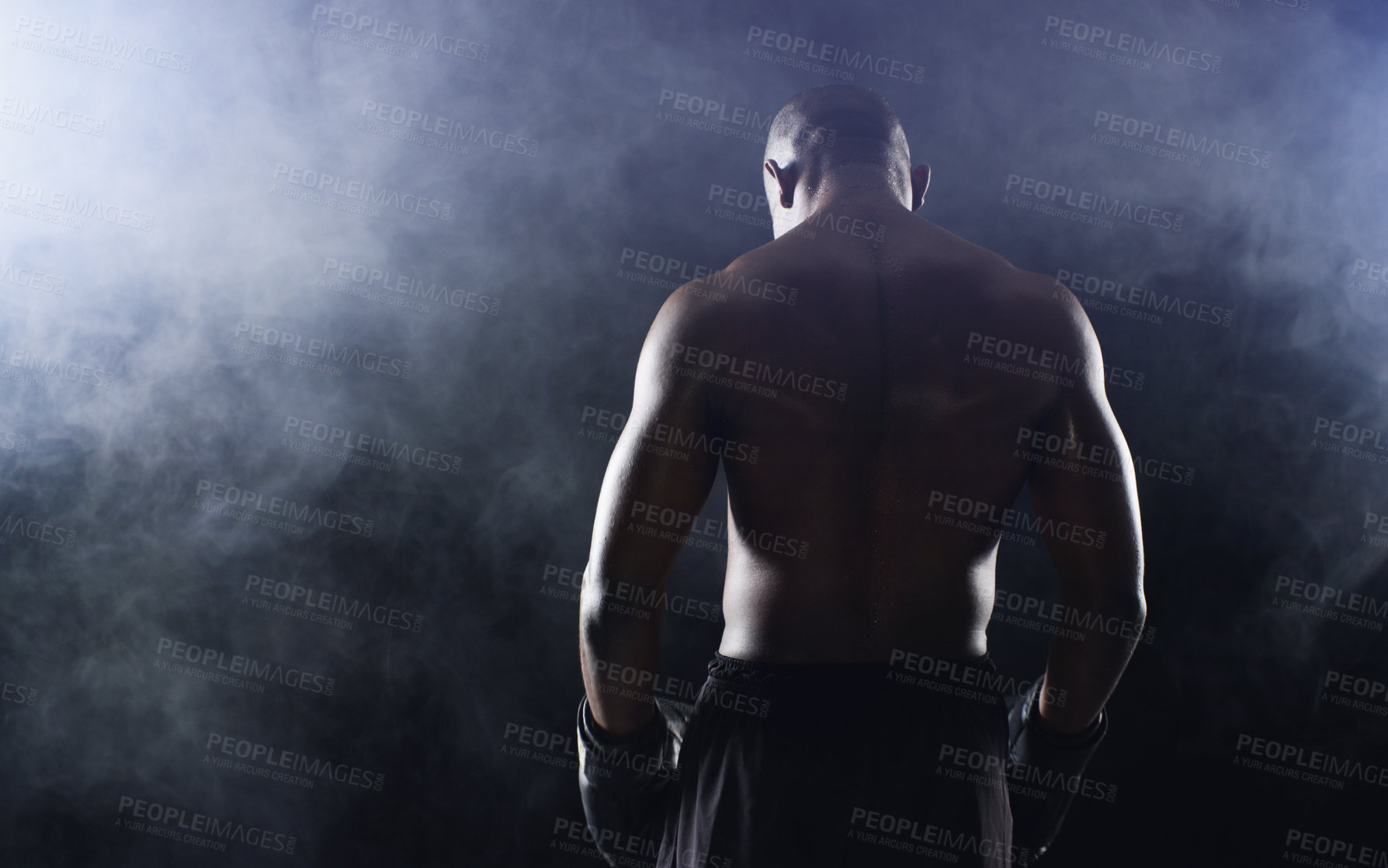 Buy stock photo Man, boxer and back of fighter athlete on black background in studio with smoke mist, competition or muscle. Male person, gloves and rear view for sports exercise with endurance, training or serious